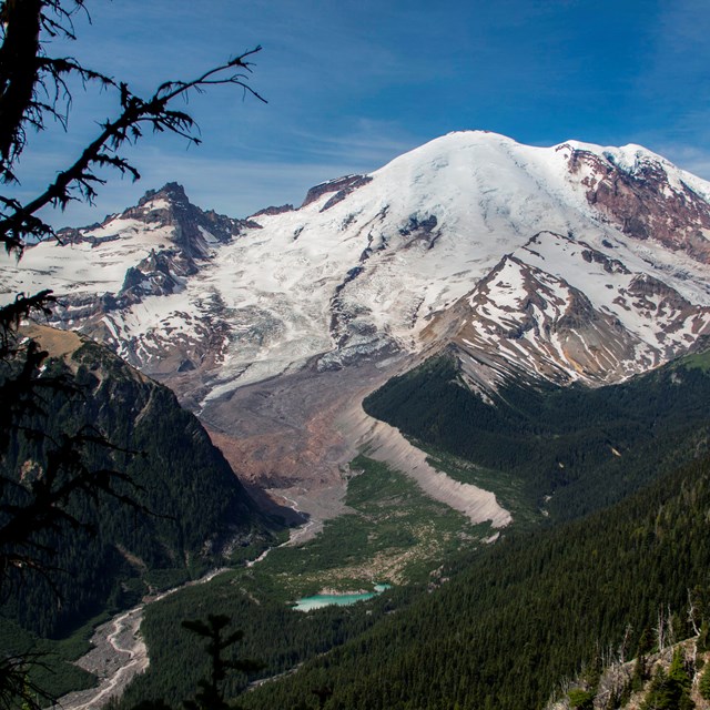 photo of a snow covered volcanic peak