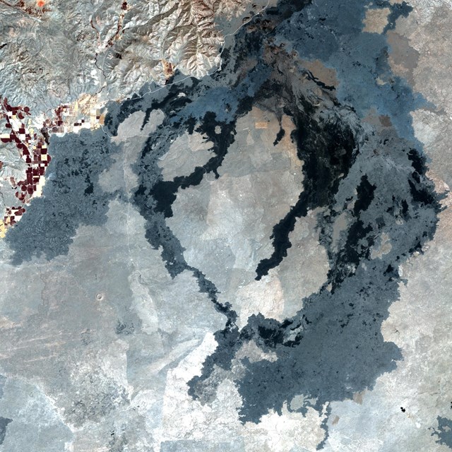 satellite image of lava flows across a large basin