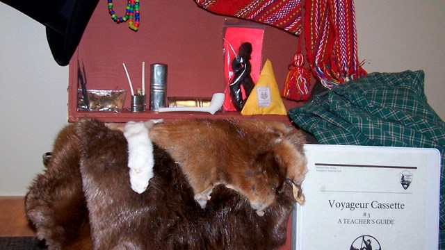 Image of red trunk with beaver pelt