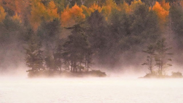 Image of fog rolling over a lake