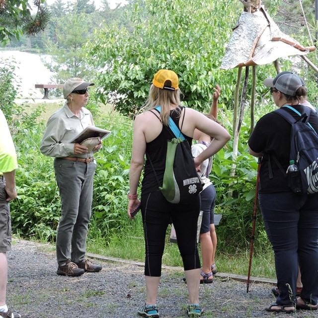 Group of people on path in garden