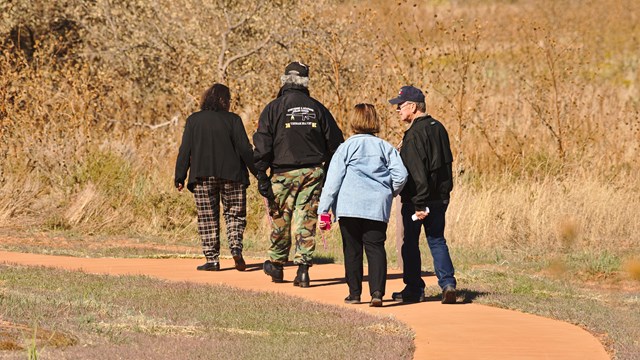 Photograph of visitors walking the park trail