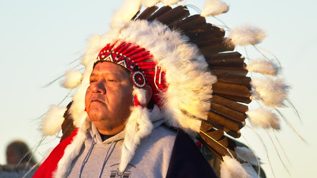 A Cheyenne Chief wearing a headdress