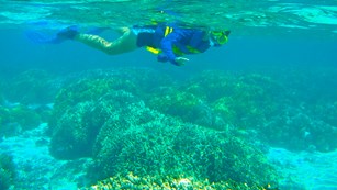 Young snorkeler in Guam's waters.