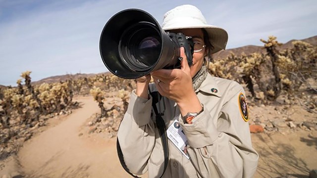 Elementary student bird watching with binoculars