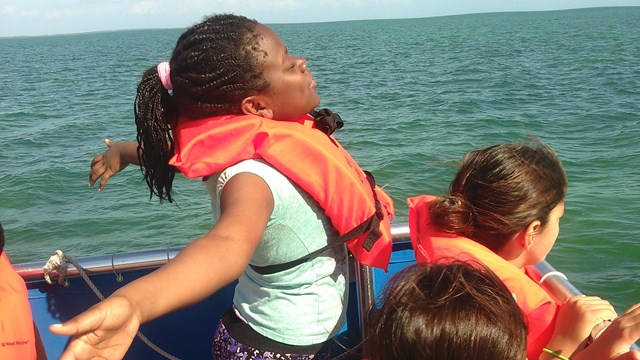Youth enjoying a day on the water.