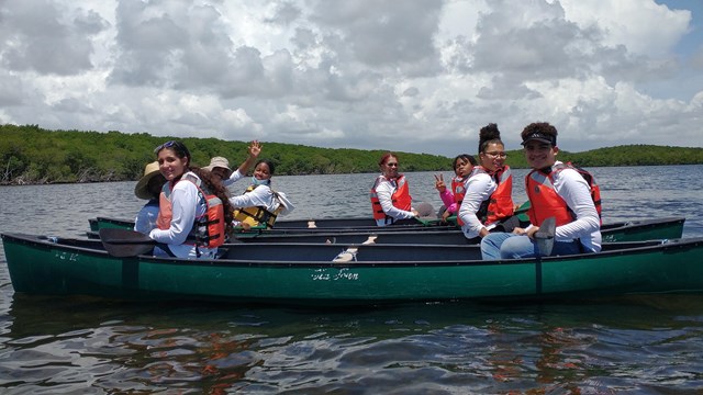 High school students enjoying paddling 