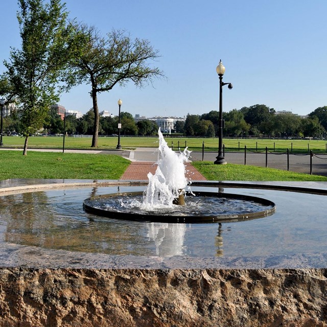 Haupt fountain with the south view of White House in background