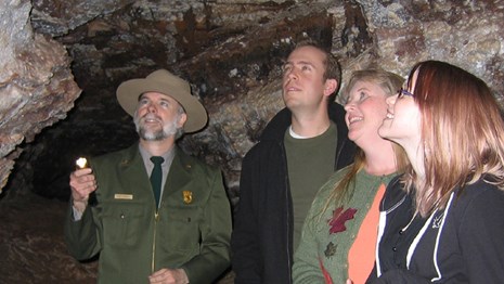 A ranger shows visitors Wind Cave