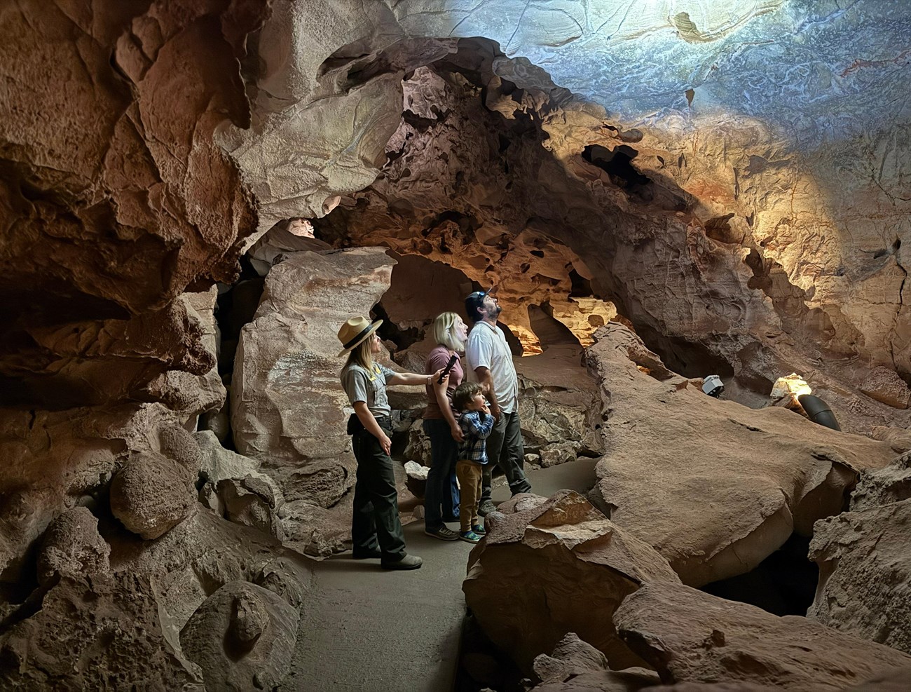 A ranger shows visitors Wind Cave