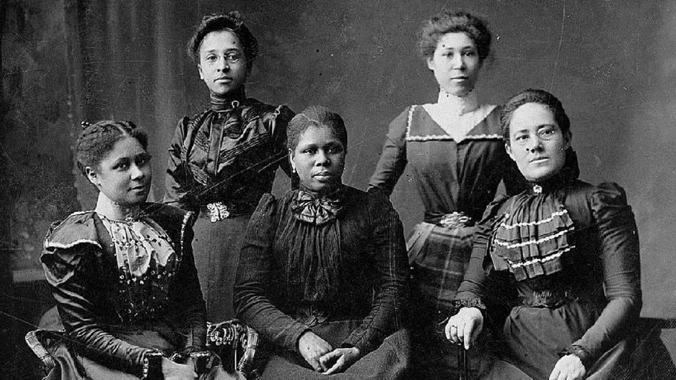 Five African American women posed for a photo,