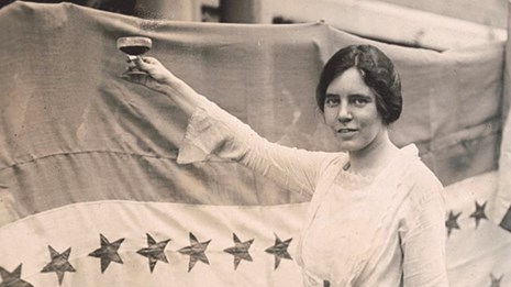 Black and white photo of Alice Paul and the Suffrage Flag LOC