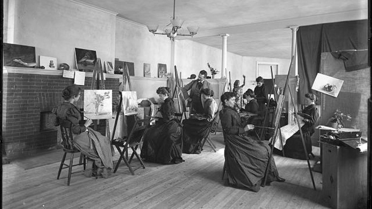 Women painting at easels