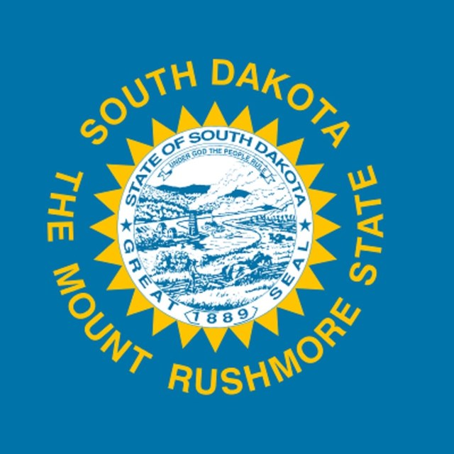 State flag of South Dakota, courtesy Wikipedia. 