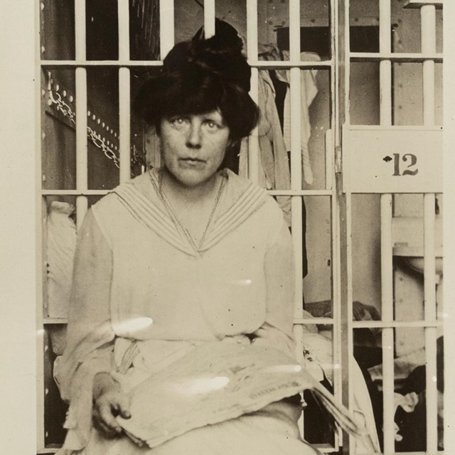 Woman in jail cell. 