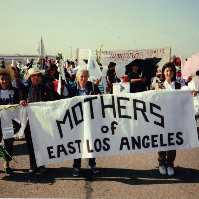 Group of women carrying a banner reading Mothers of East Los Angeles
