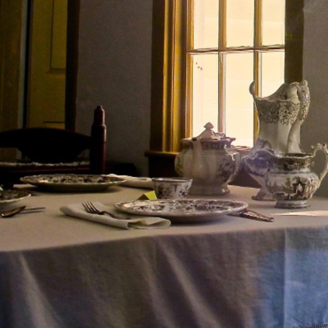 a table setting inside Clara Barton's homestead