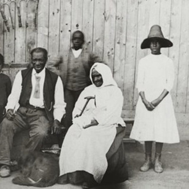 An elderly Tubman seated, surrounded by family, Schomburg Center for Research in Black Culture. 