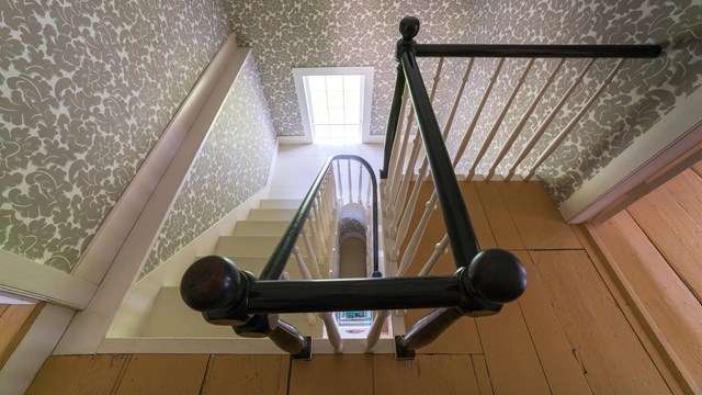 A view looking down the stairwell in the Stanton House.