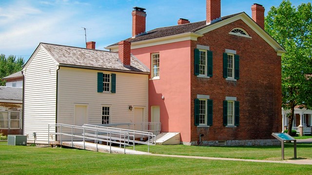 The back side of the M'Clintock House, showing a wheelchair-accessible ramp.