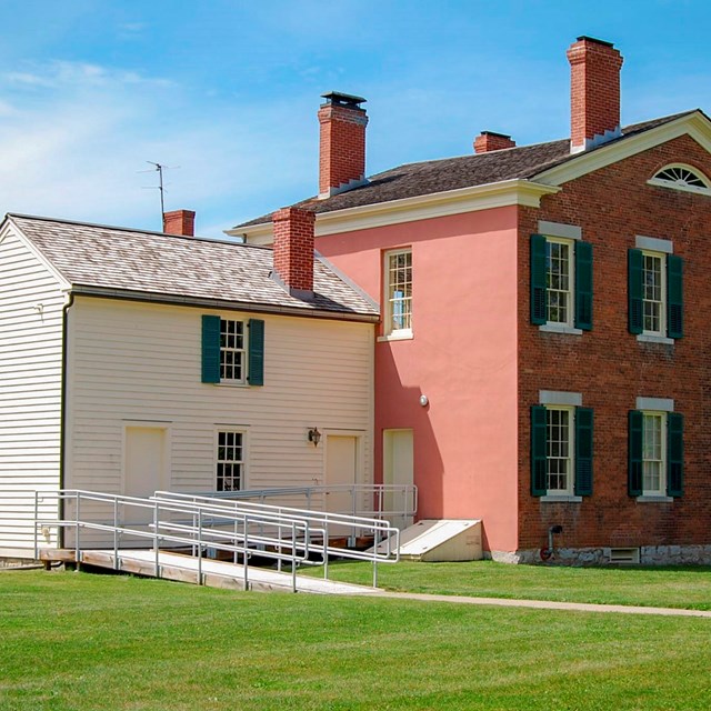 The back side of the M'Clintock House, showing a wheelchair-accessible ramp.