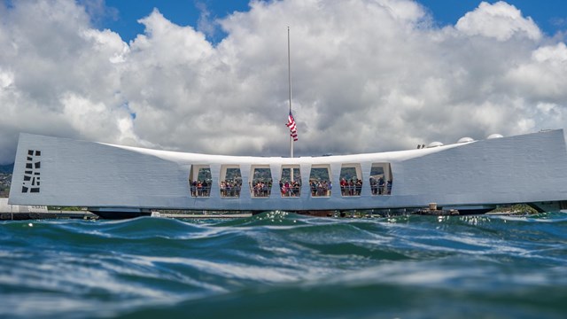 white memorial atop blue ocean water
