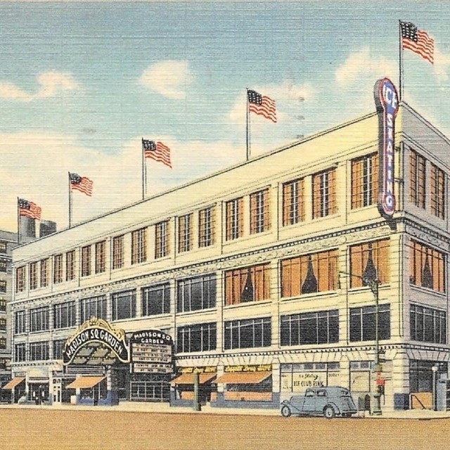 Illustrated image of square building with American flags lining the top