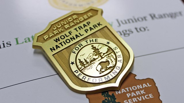 Wolf Trap Junior Ranger book and badge