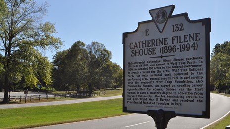 A roadside sign details Catherine Filene Shouse's life. 