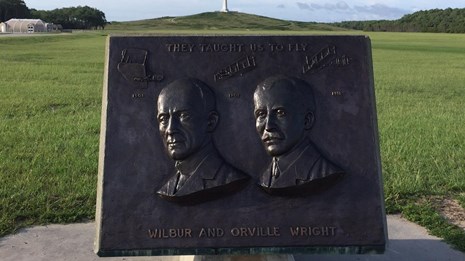 Plaque with monument in far distance