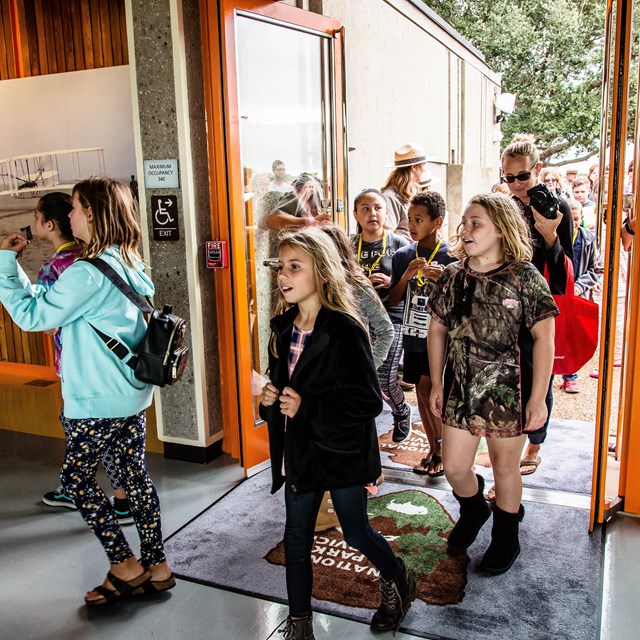 Students entering the Visitor Center