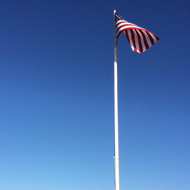 American flag over visitor center