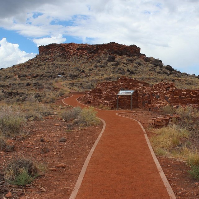 A gravel trail leading to the base of Citadel Pueblo 