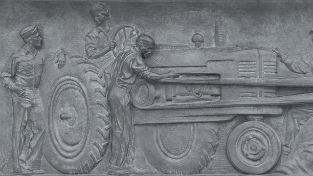 Bas relief showing American agriculture