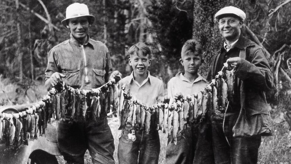 Visitors with fish catch (1933)