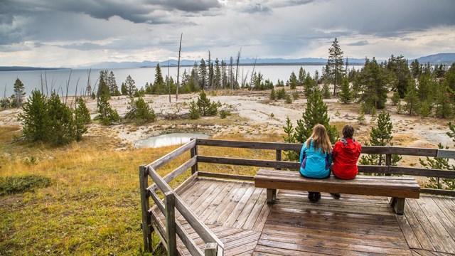 People enjoying the views at the West Thumb Geyser Basin