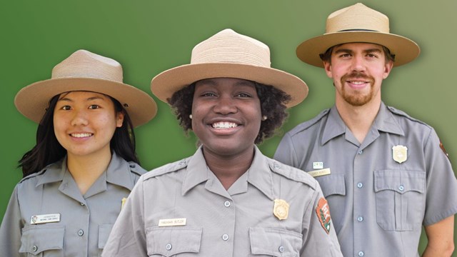 Three park rangers, two women and one man, in uniform with flat hats in front of a green background.