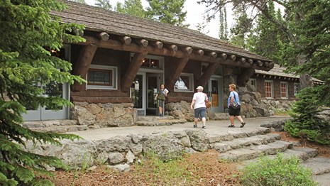Visitors stopping by Fishing Bridge Visitor Center & Trailside Museum