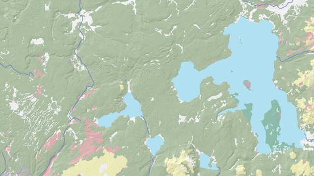 Map showing Yellowstone Lake in blue and land vegetation is green, red, and yellow.