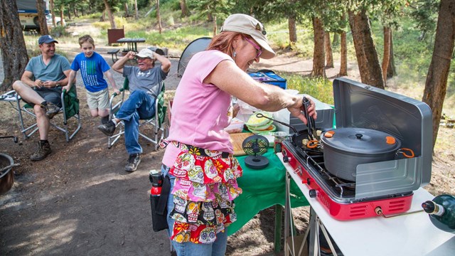 Campers preparing dinner in the Tower Campground