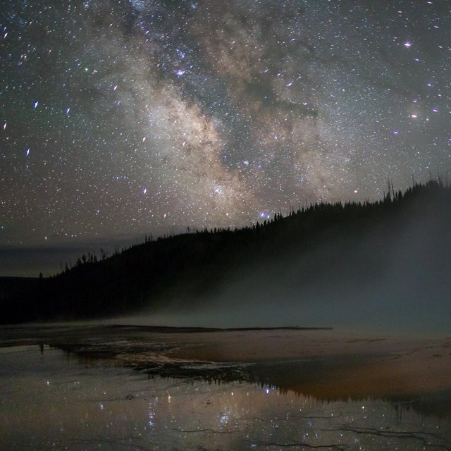 the milky way above Grand Prismatic Spring