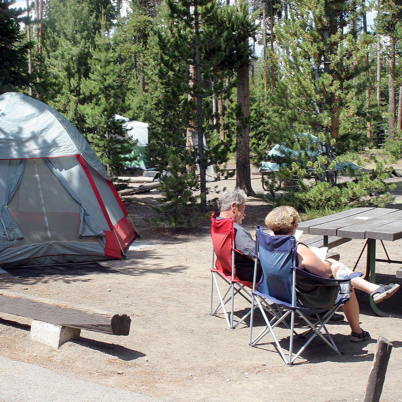 Tent campsite with visitors