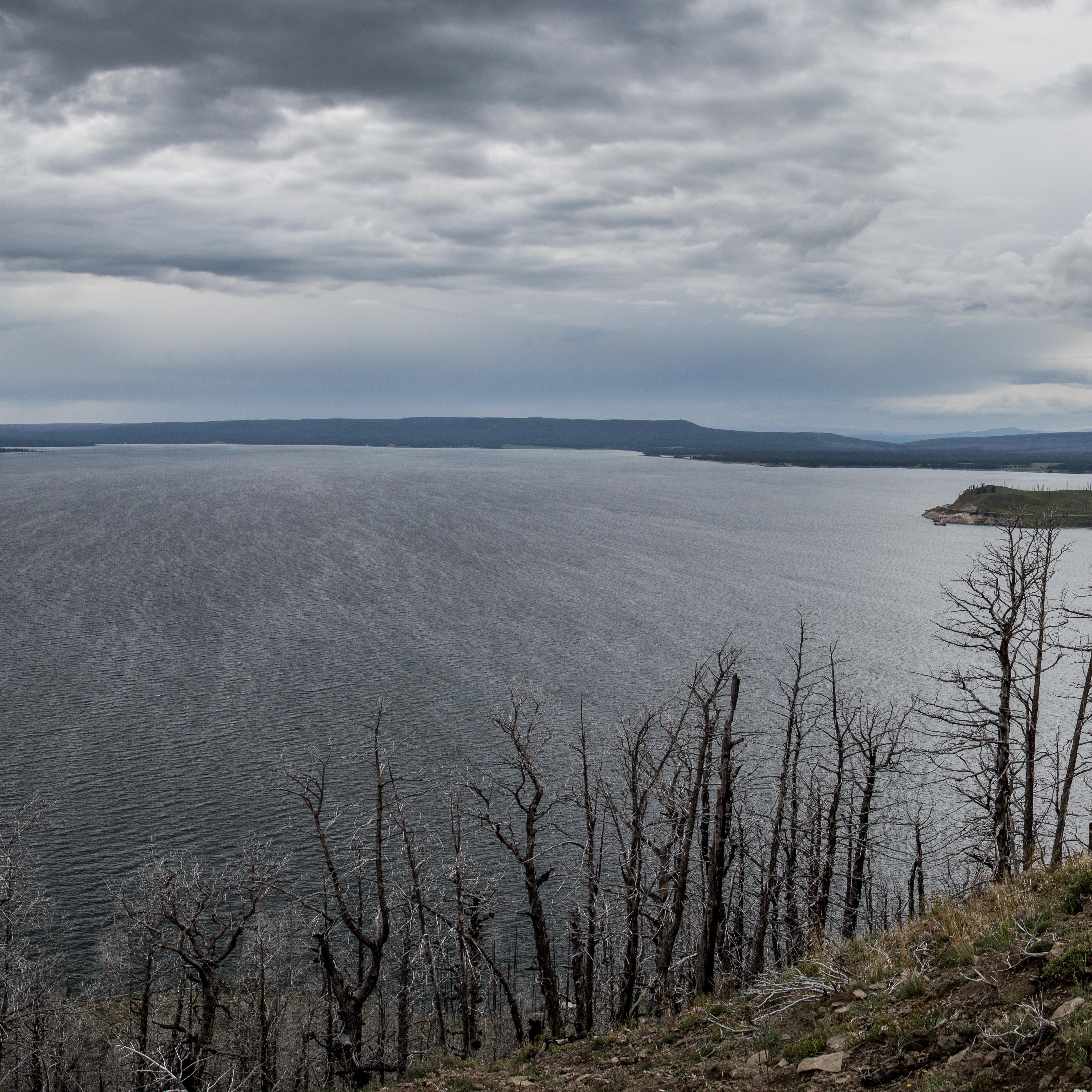 Looking down on a large body of water with gray clouds in the sky