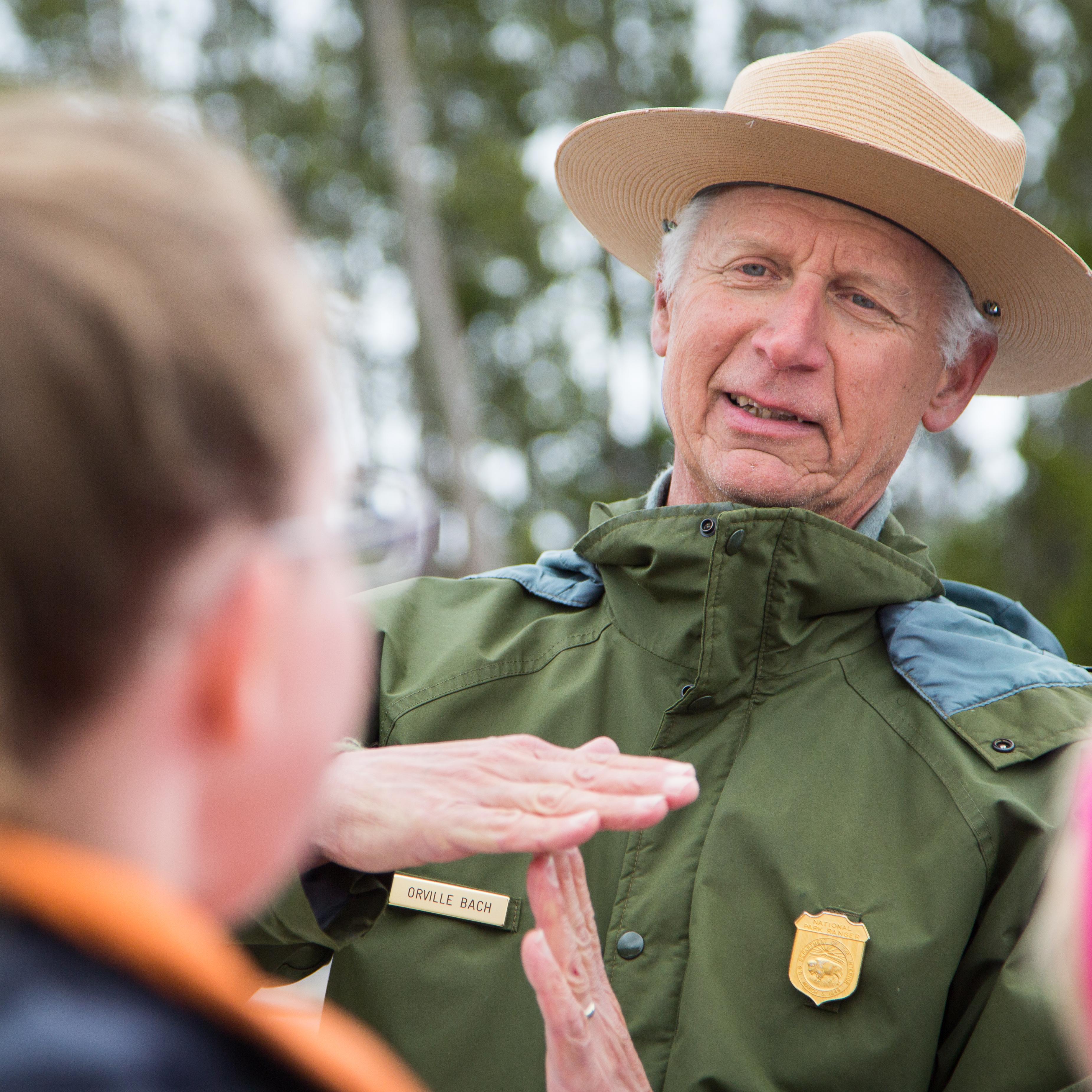 Ranger and visitor in conversation