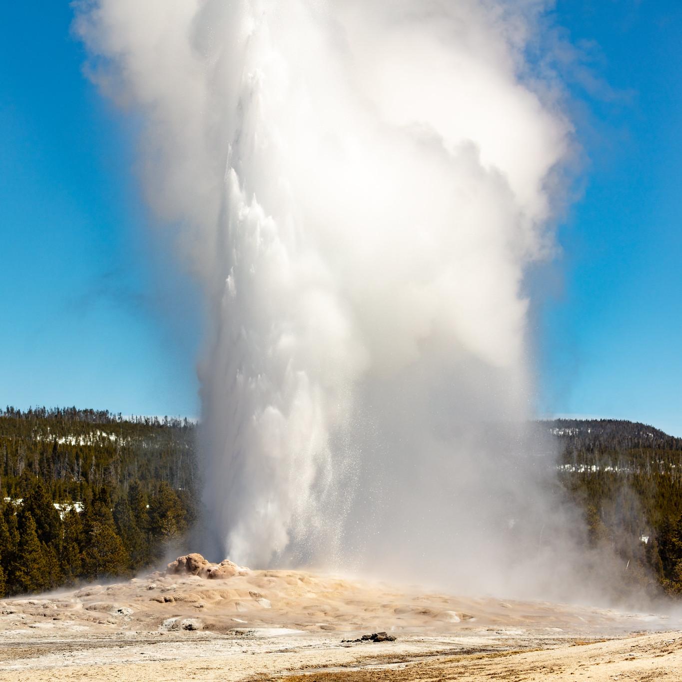 Geyser erupting into the sky.