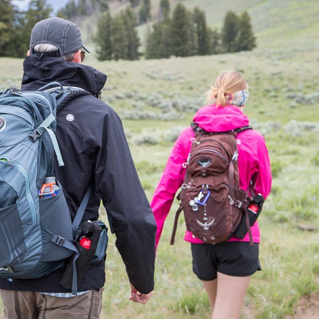 Photo of hikers with bear spay
