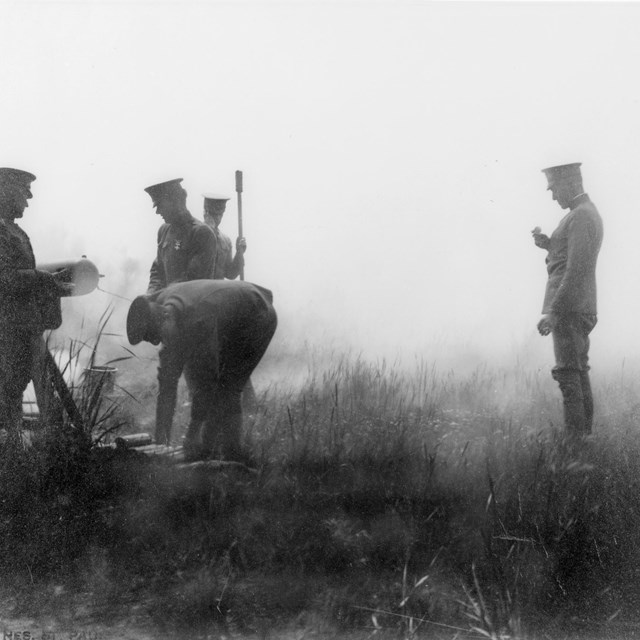 A historical photo of Calvary officers practicing with a canyon.