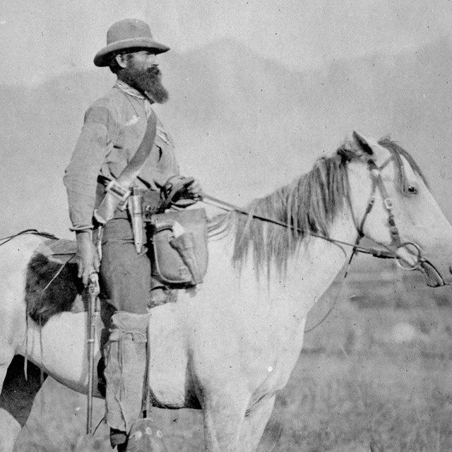 Nathaniel P. Langford on WHITE HORSE W/ LONG BARRELED HANDGUN