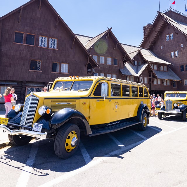 Historic White Buses at Old Faithful Inn