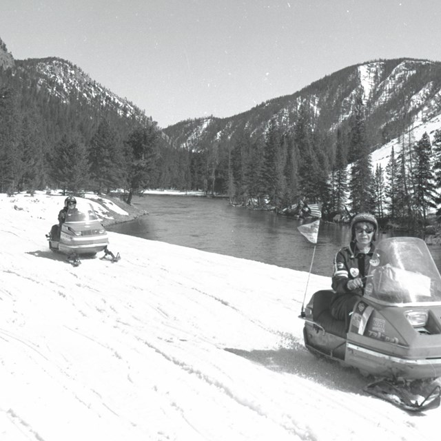 Snowplow clearing roads in park